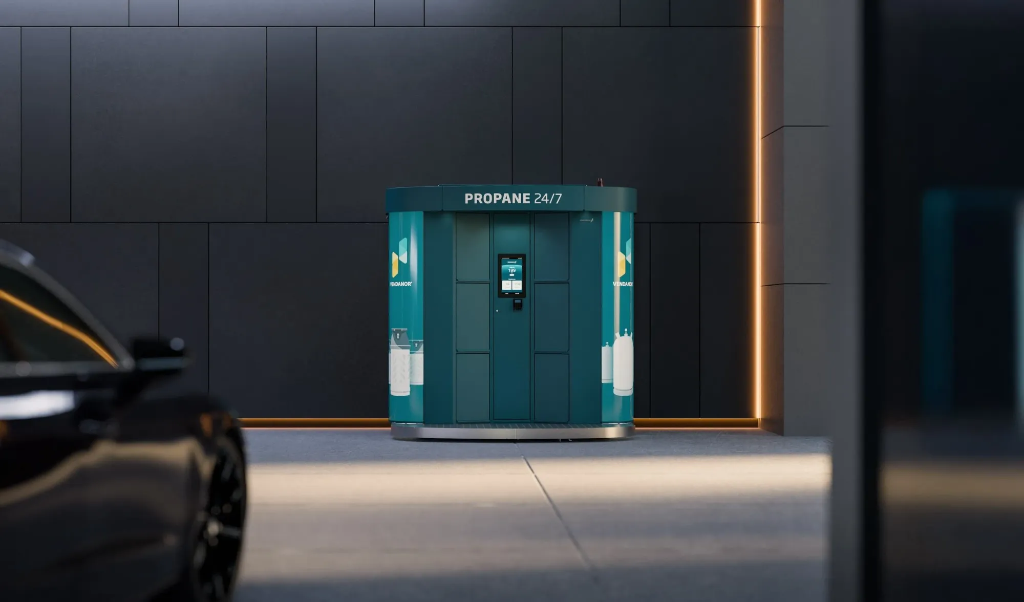 Teal Vendanor Propane Vending Machine against a dark panelled wall, a car blurred in the foreground.